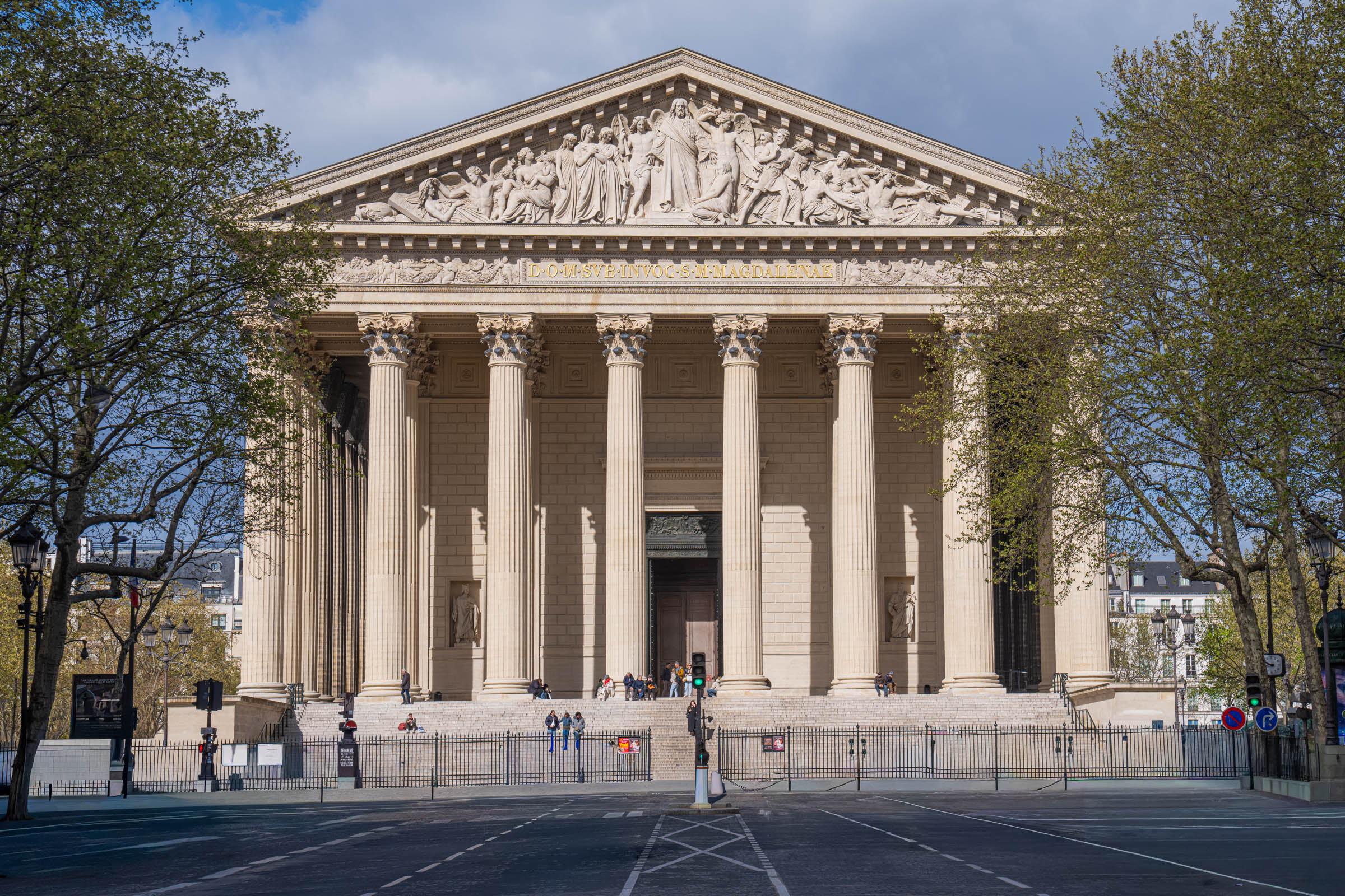 The neoclassical Église de la Madeleine in Paris with its Corinthian colonnade seen from the side