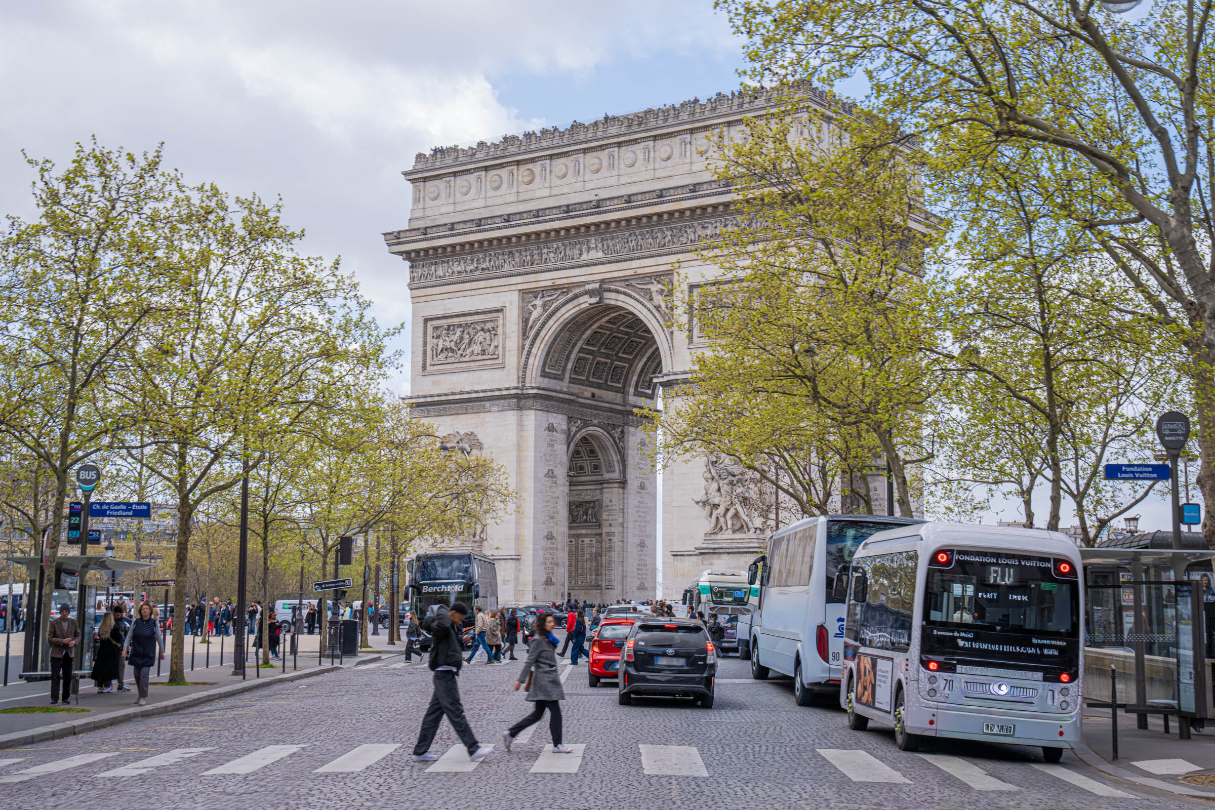Close-up of the Arc de Triomphe in Paris showing its monumental sculpted panels and frieze