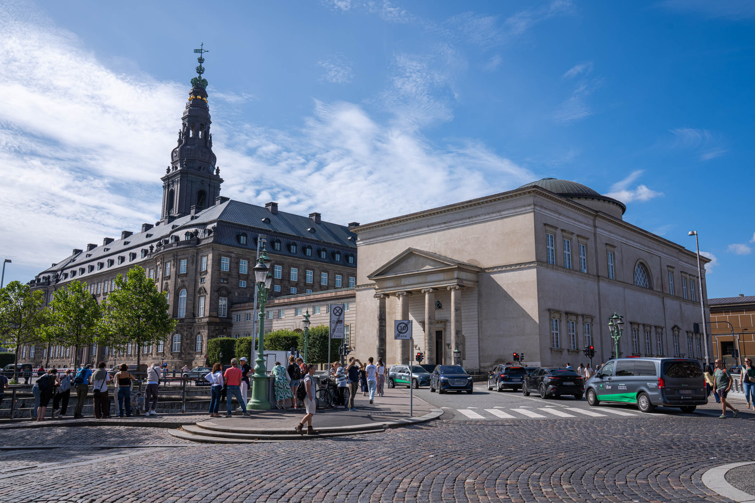 Christiansborg Palace and the Palace Church seen from Ved Stranden on a bright summer day in Copenhagen