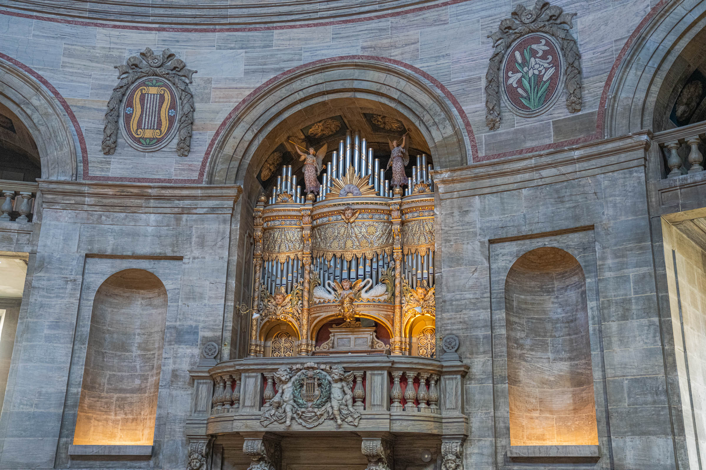 Gilded pipe organ with angel figures inside Frederik's Church, the Marble Church, in Copenhagen