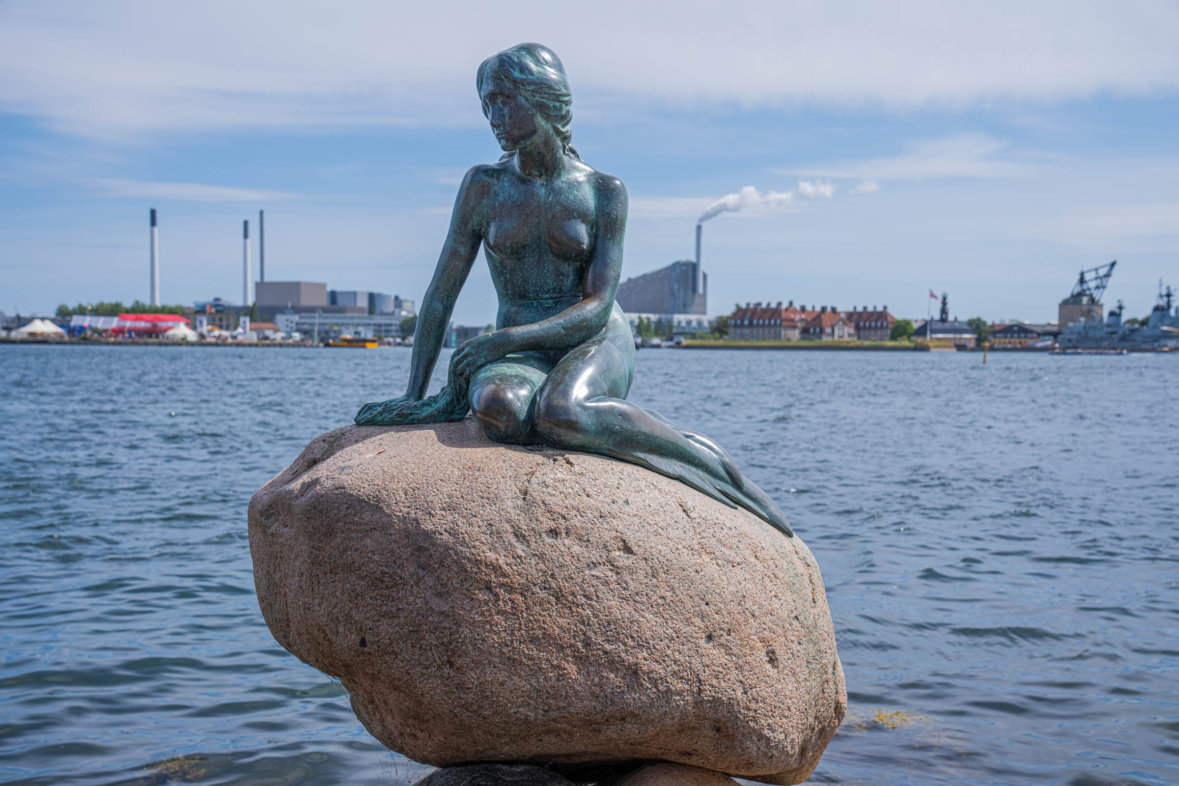 The Little Mermaid bronze statue on her granite rock at Langelinie promenade in Copenhagen