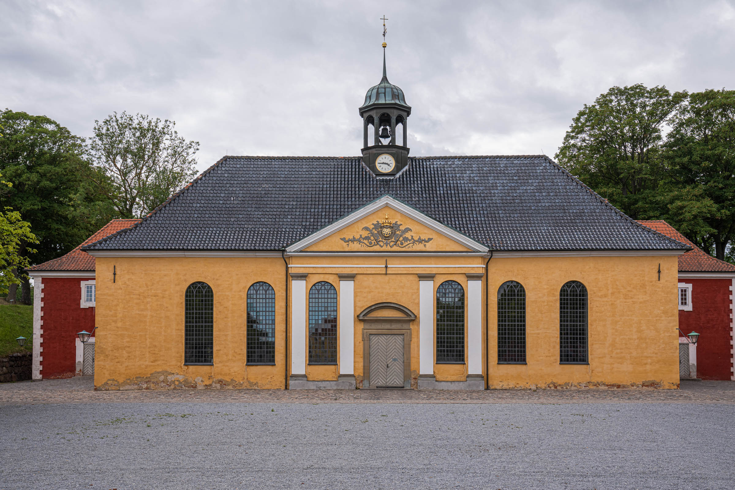 Yellow Citadel Church of 1704 inside Kastellet fortress in Copenhagen with its bell tower and clock