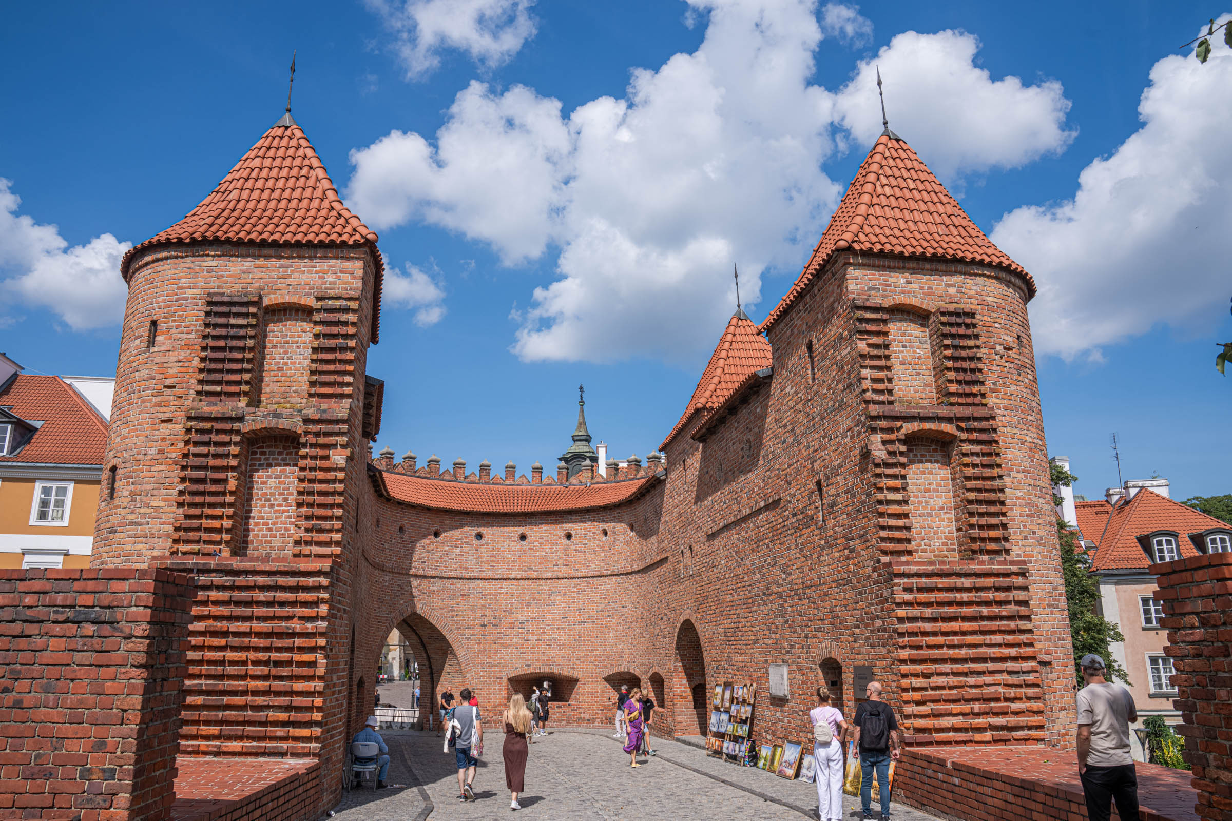 The Warsaw Barbican, a 16th-century brick gatehouse rebuilt after the Second World War, Mr.M by Marko Tadić