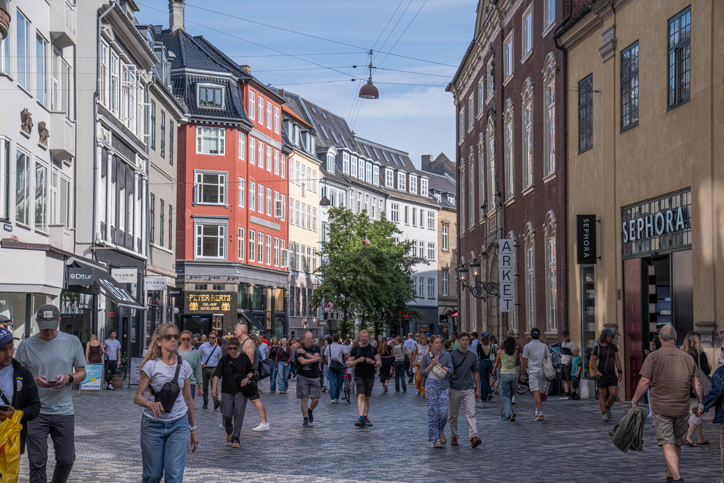 Shoppers filling the Strøget pedestrian street in central Copenhagen on a bright summer afternoon, photo by Marko Tadić, founder of Mr.M blog
