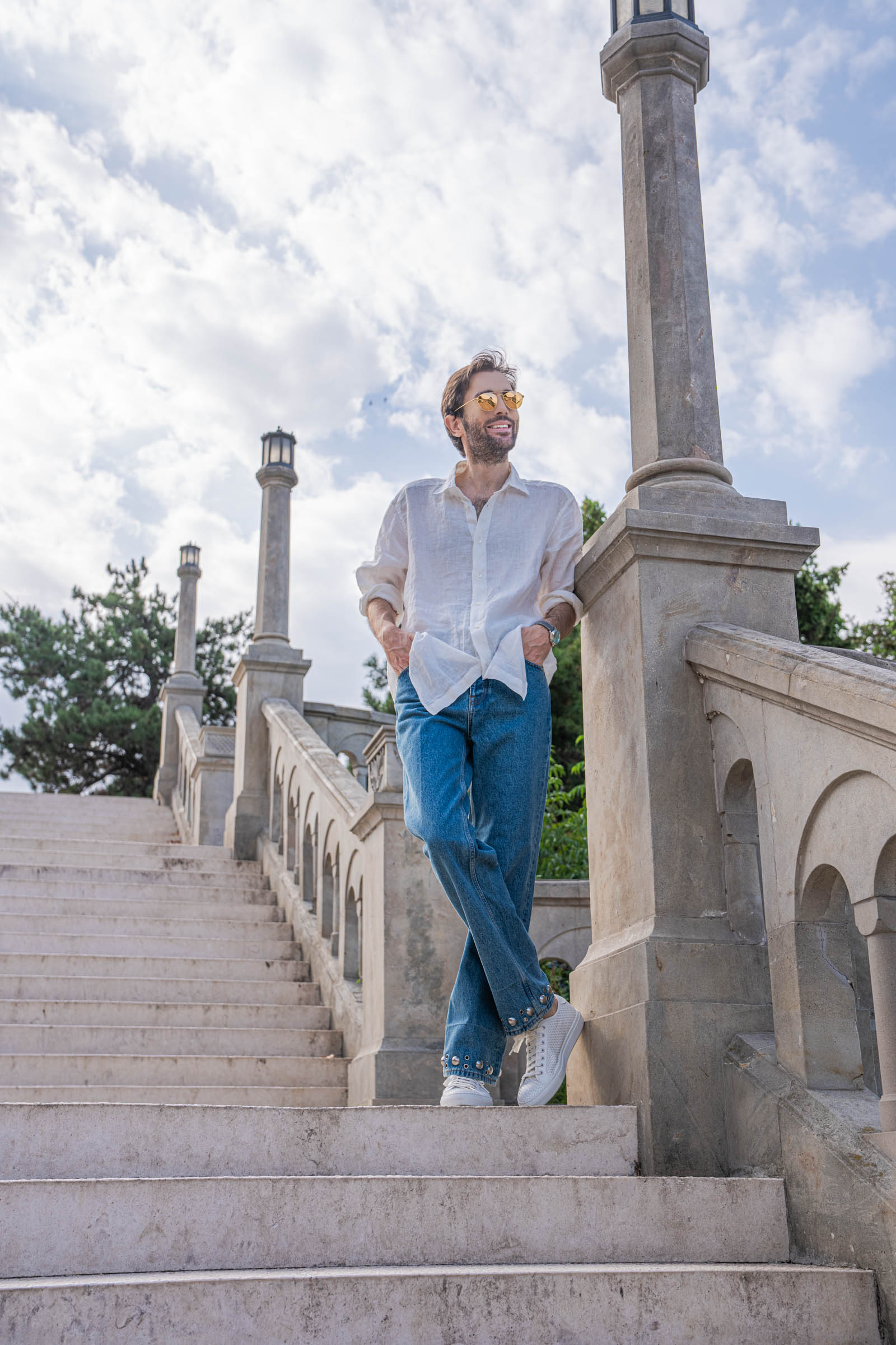 Marko Tadić at the Kalemegdan belvedere in a Valentino summer outfit and gold sunglasses