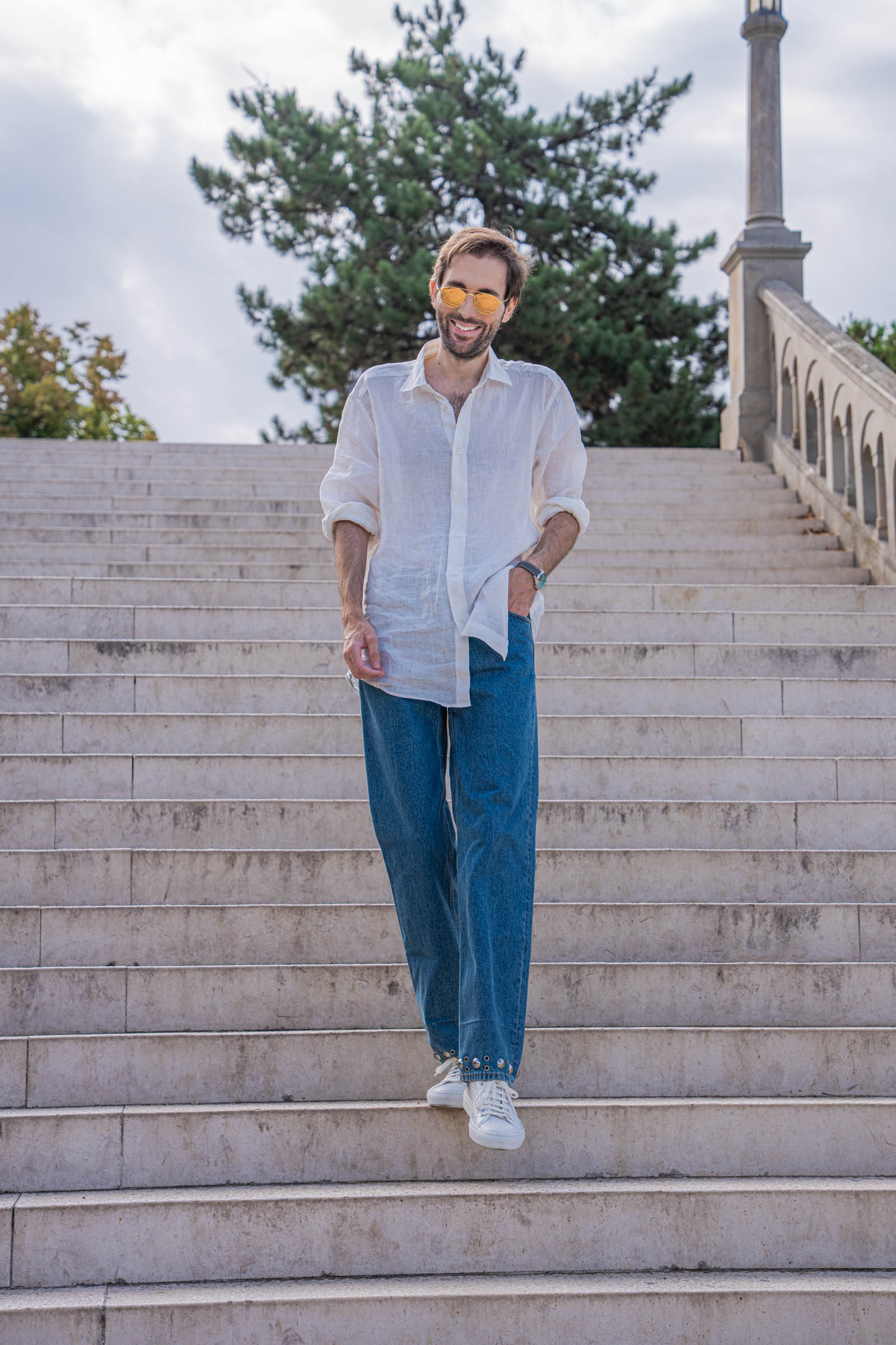 Full-length Valentino summer outfit on Marko Tadić: linen shirt, blue denim and white sneakers