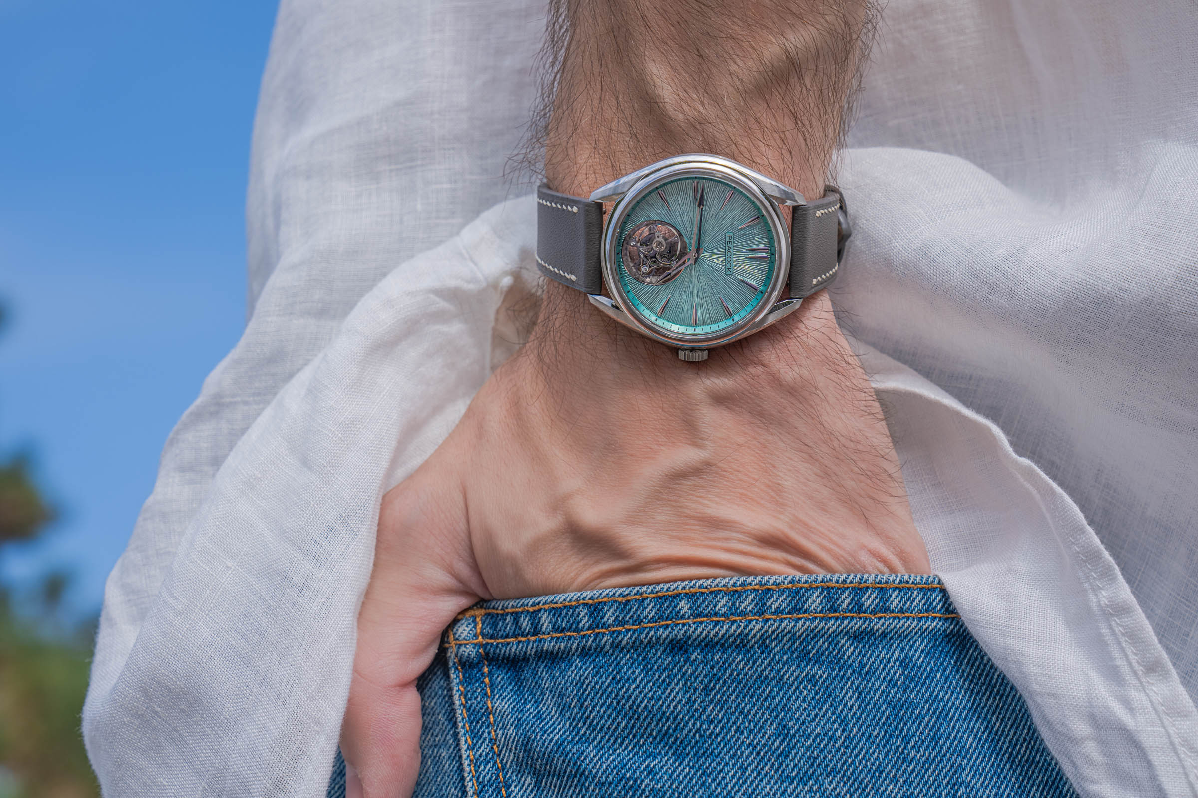 Peacock Divine Craft Tourbillon paired with Valentino denim on Marko Tadić's wrist